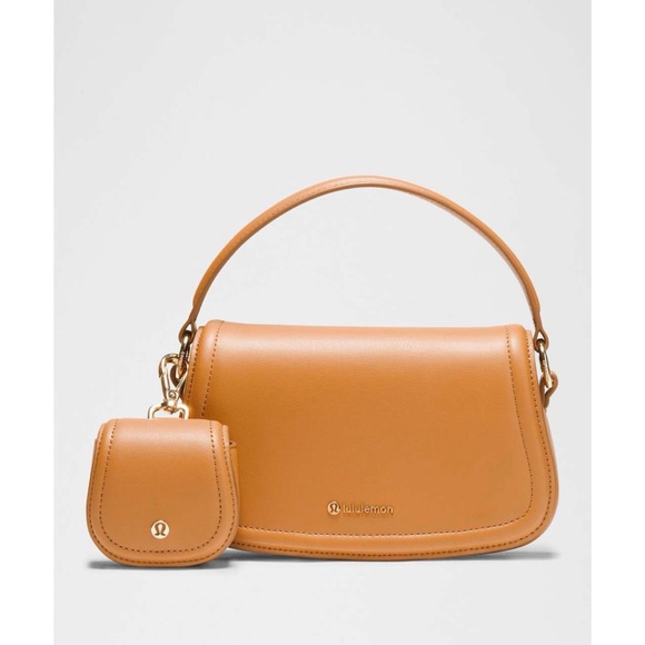 lululemon athletica Handbags - Lululemon Cactus Leather Alternative Mini Bag in Chestnut Brown
